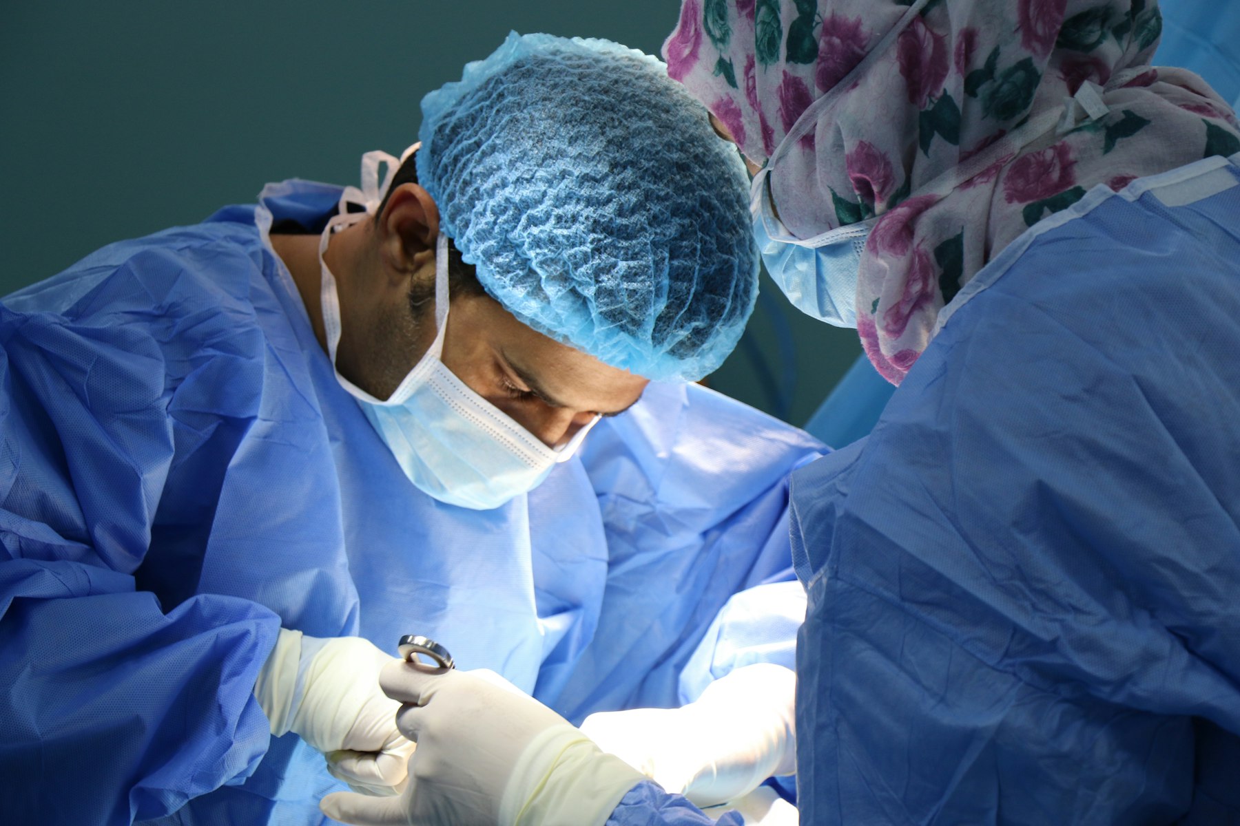 Dr. Johnson operating — portrait slot pending the practice photo shoot